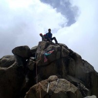 John-and-Chris-on-the-summit-of-Bation.