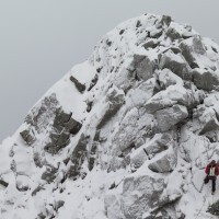 Abseiling off one of the tops on the ridge