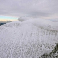 Climbers on the classic Carn Mor Dearg Arete