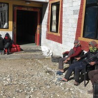 Our local porters and guide relaxing in sun after a hard day's work