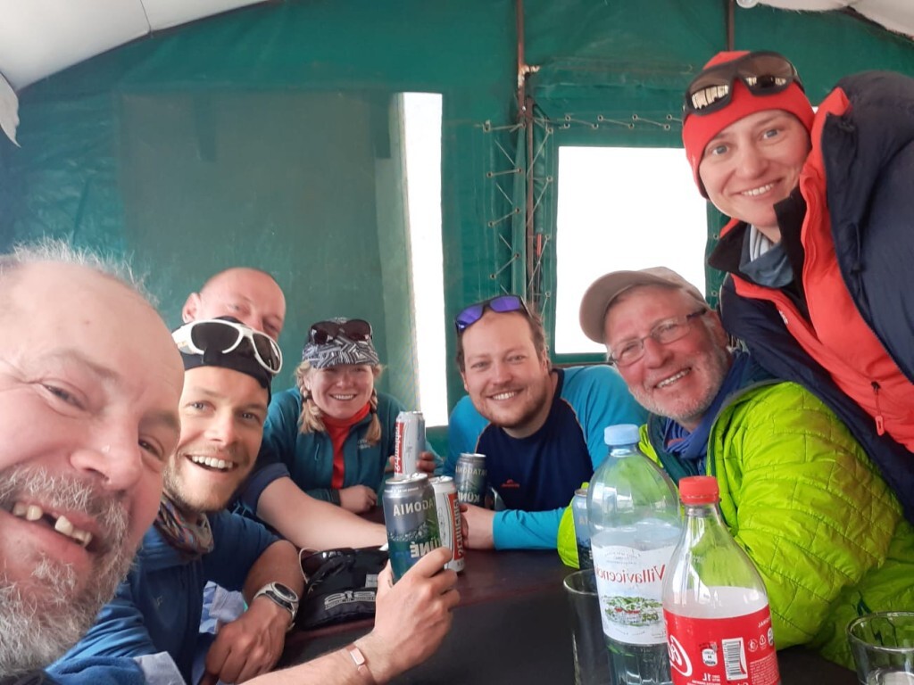 The team enjoying a beet at Plaza del Mulas base camp